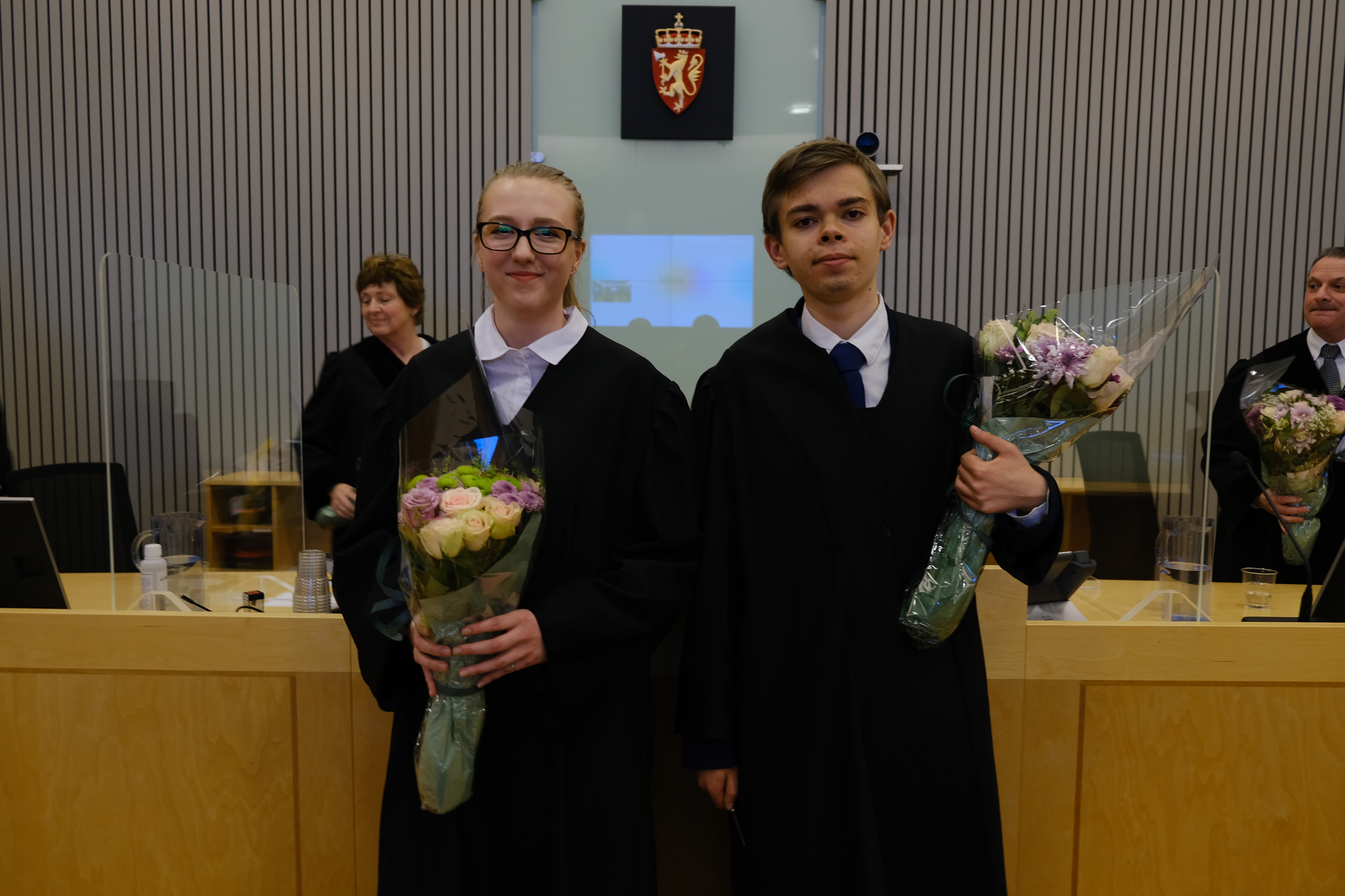 Jusstudenter med kappen på